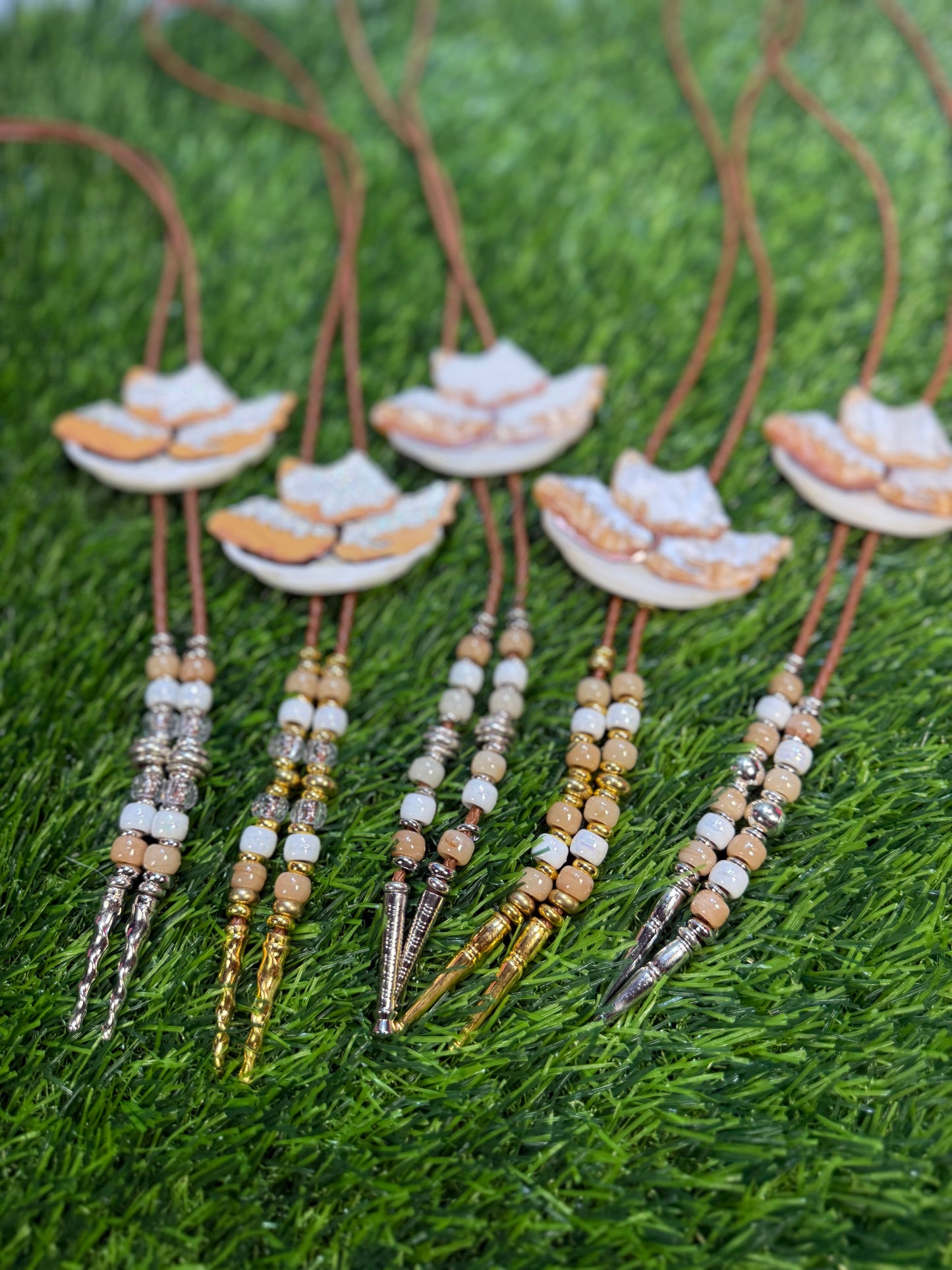 Order of Beignets Bolo Tie - Brown Beads