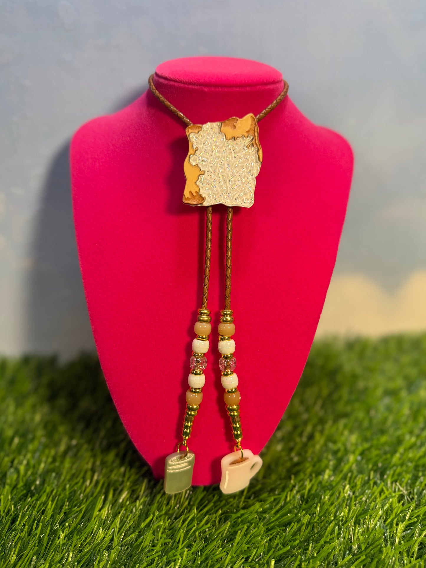Beignet Bolo Tie - Brown Beads and Charms