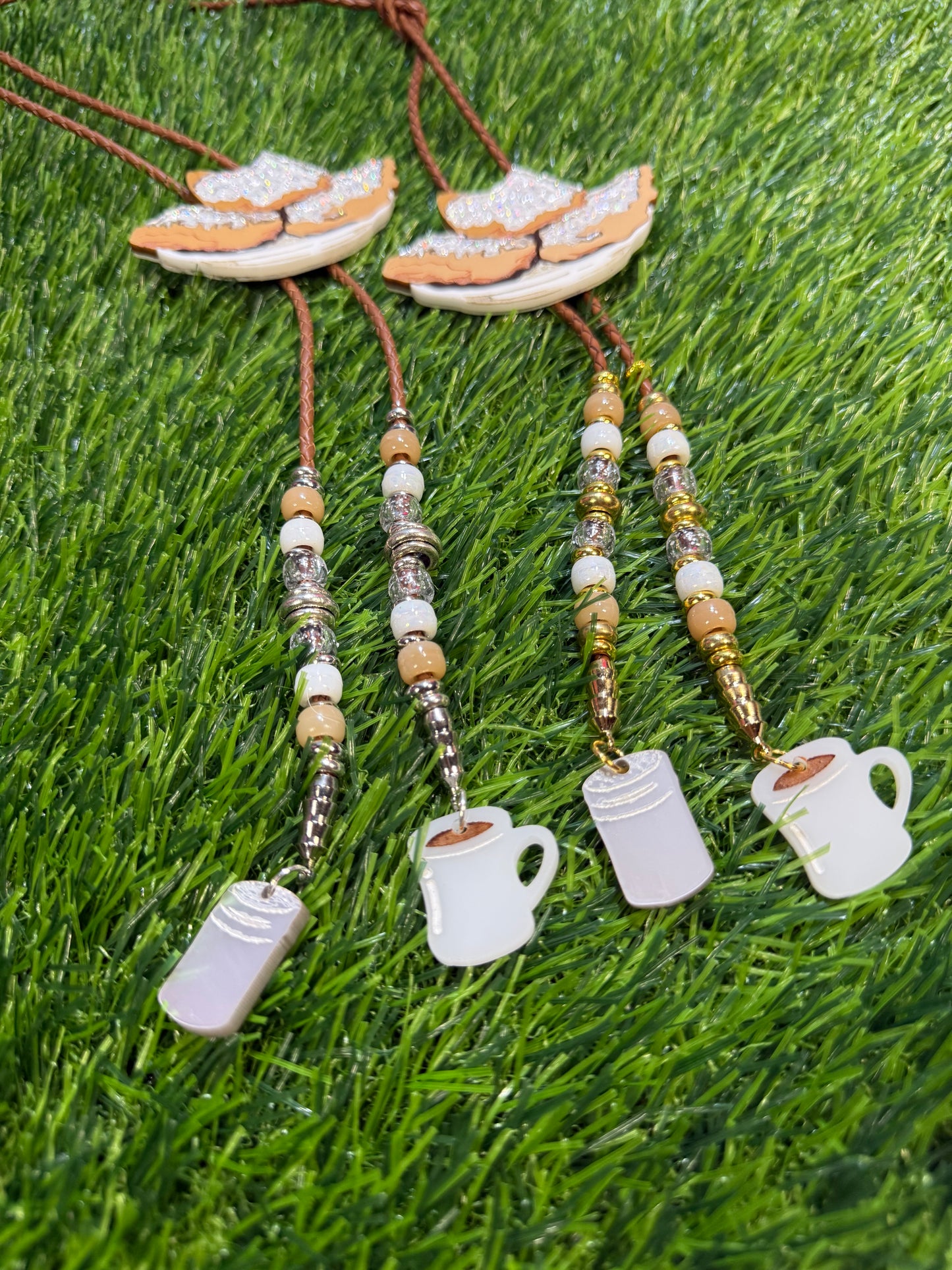 Order of Beignets Bolo Tie - Brown Beads with Charms