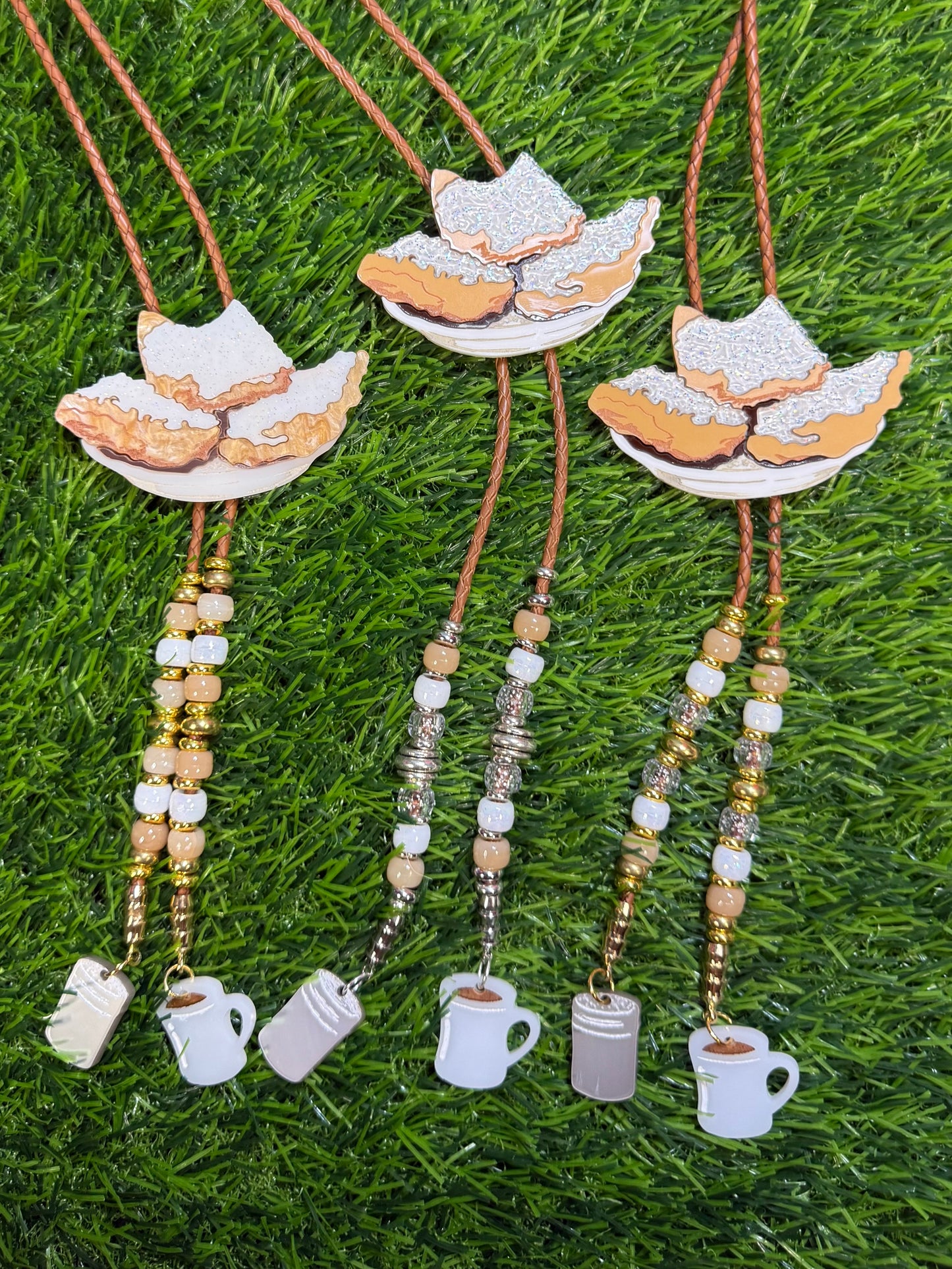 Order of Beignets Bolo Tie - Brown Beads with Charms