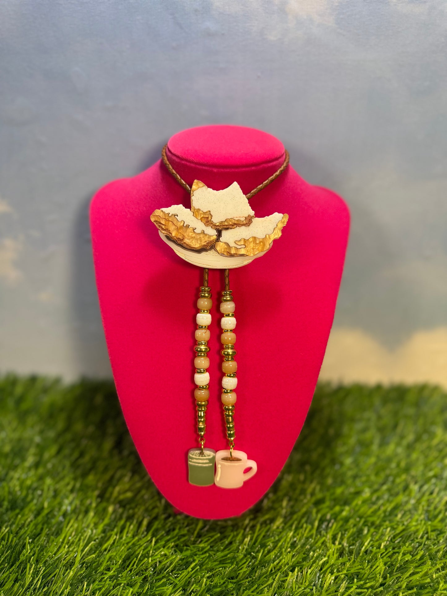 Order of Beignets Bolo Tie - Brown Beads with Charms