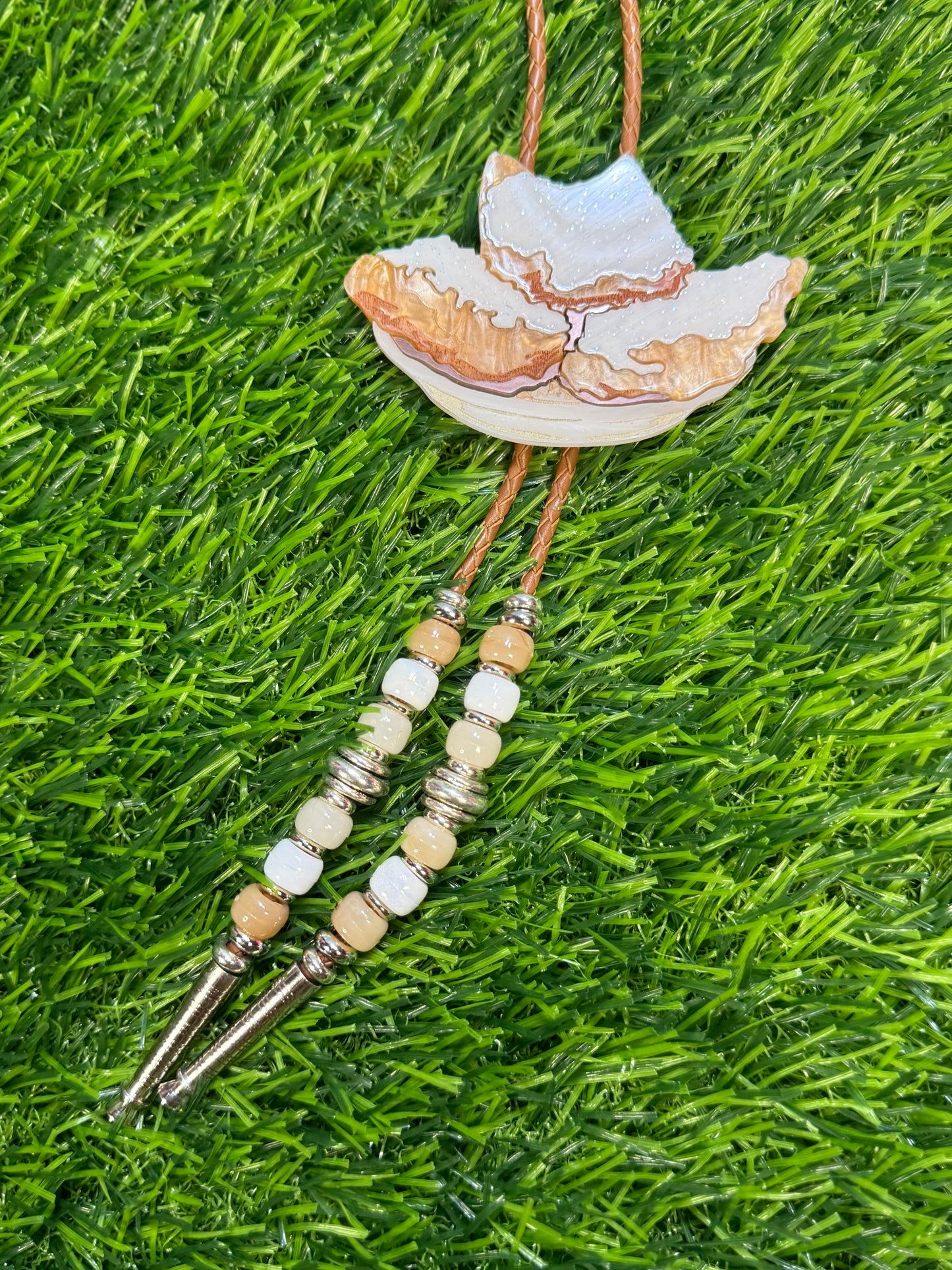 Order of Beignets Bolo Tie - Brown Beads