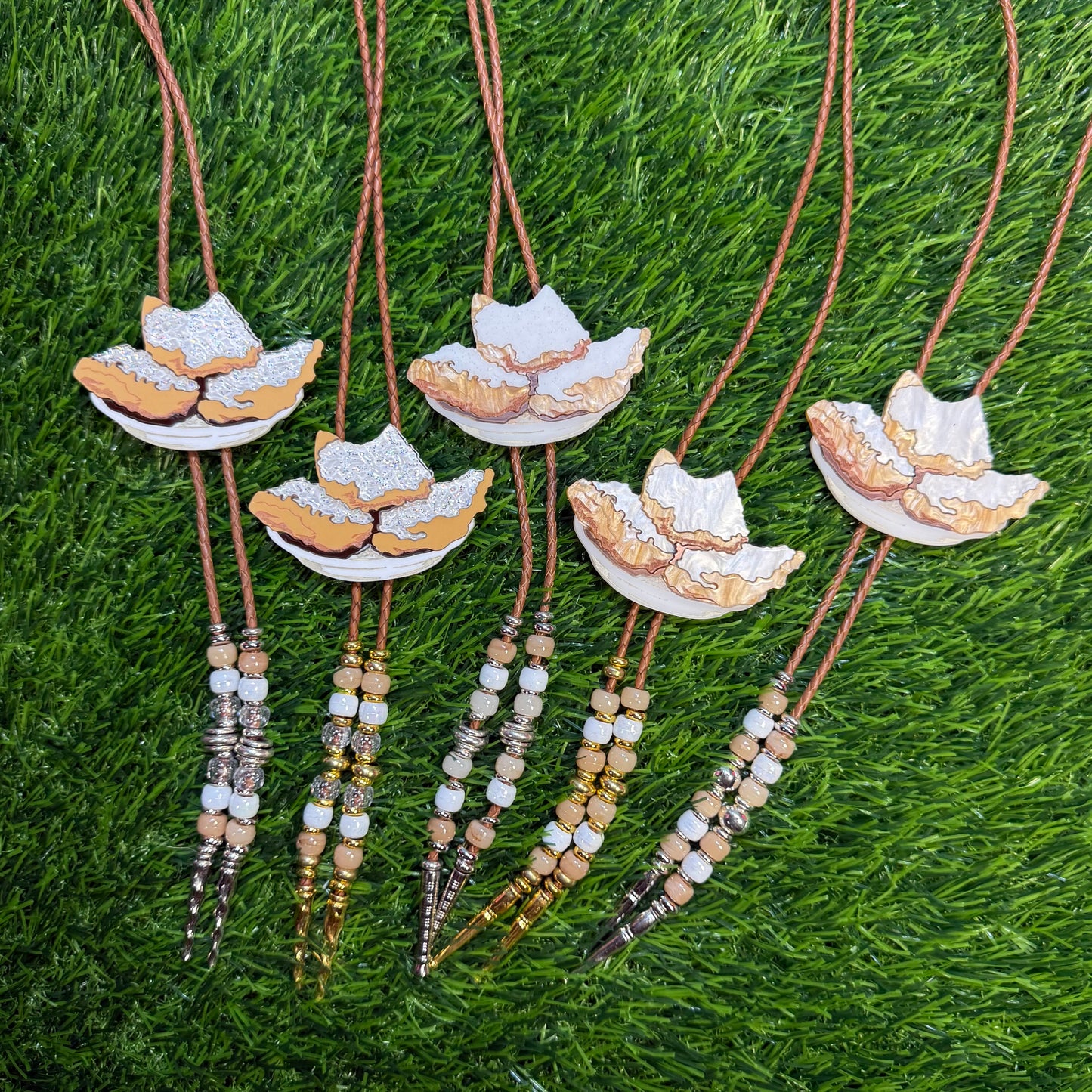 Order of Beignets Bolo Tie - Brown Beads