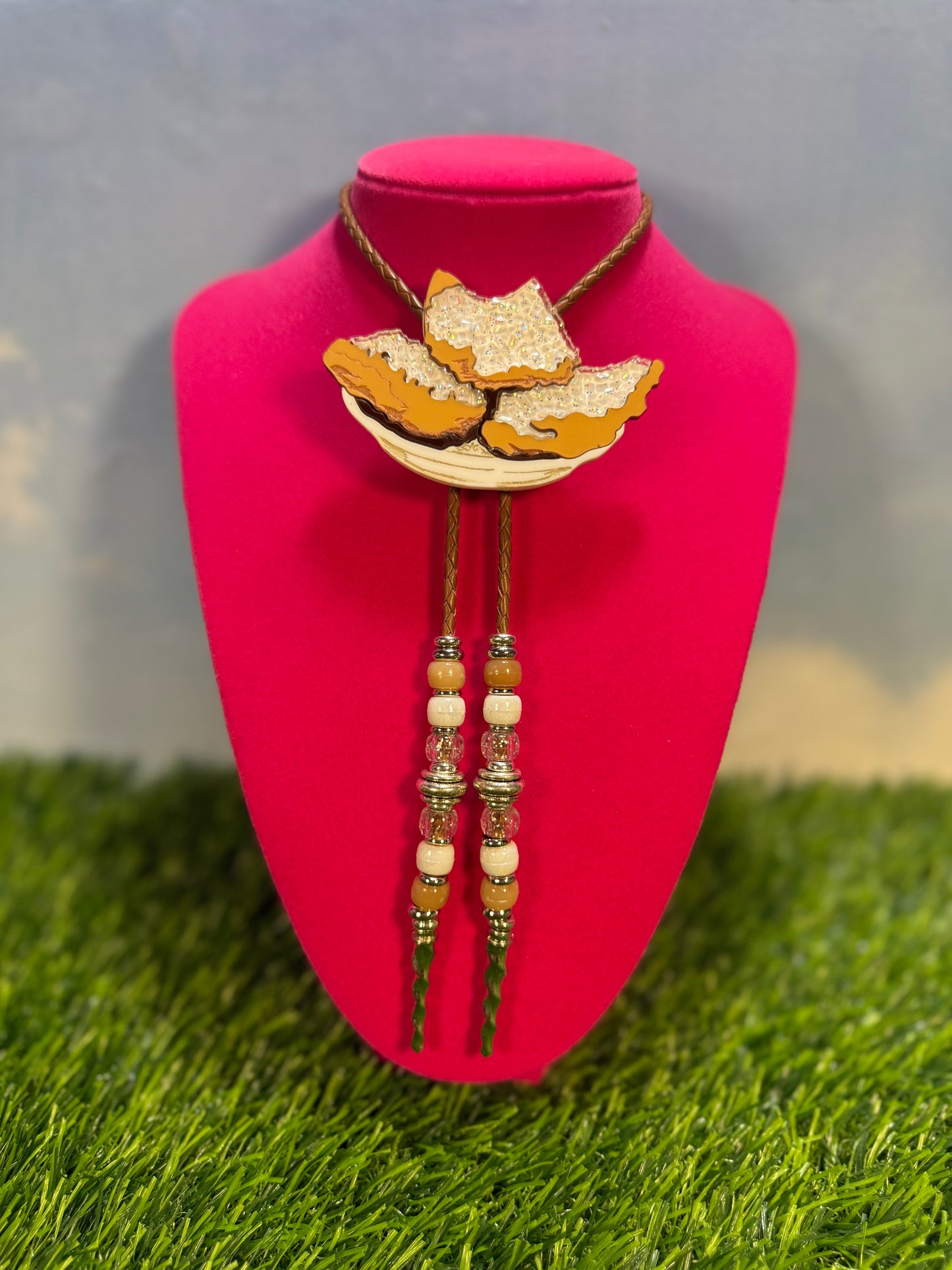 Order of Beignets Bolo Tie - Brown Beads